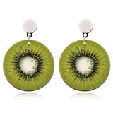 Cosmic girl with fruit earrings